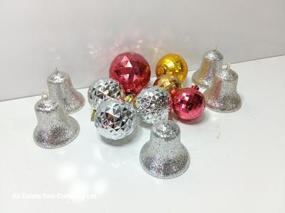 Variety of plastic Disco ball ornaments and plastic glittery bells