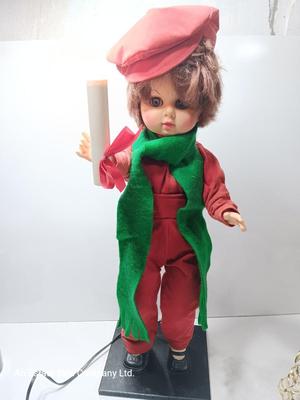 Christmas boy with light up candle