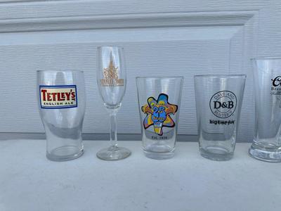 AN ASSORTMENT OF BEER, WINE AND SHOT GLASSES