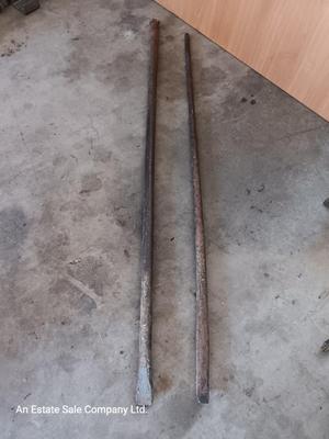 Two steel prybars