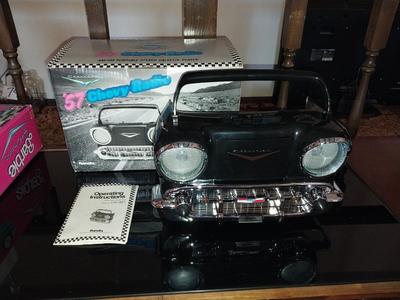 BLACK '57 CHEVY AM/FM STEREO WITH CASSETTE PLAYER