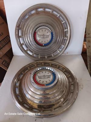 Two 1963 FordD Galaxie LTD used OEM 14" Stainless steel 18 slot hubcaps