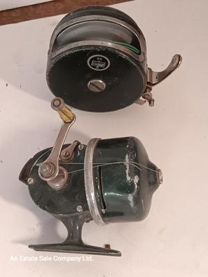 Two fishing reels Shakespeare push button Wondercast No. 1774 and green Fly fishing reel