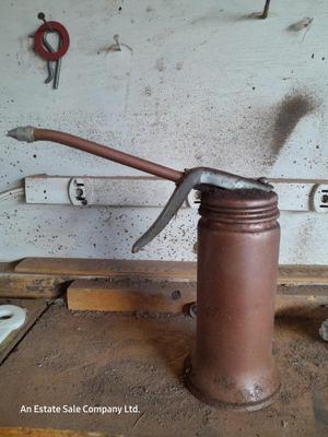Copper colored oil can