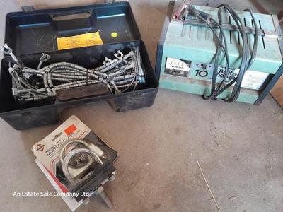 Cable type Tire chains - battery charger and new universal Muffler clamps