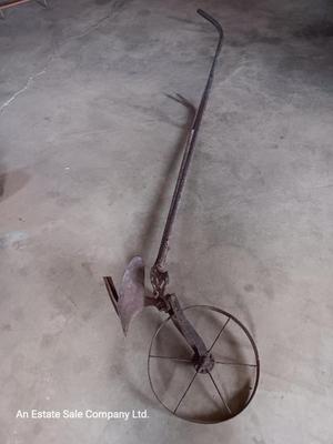 Antique hand plow for yard / garden art