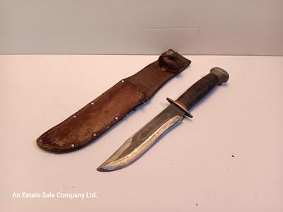 Hunting knife with leather sheath