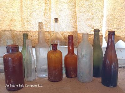 Variety of vintage glass bottles