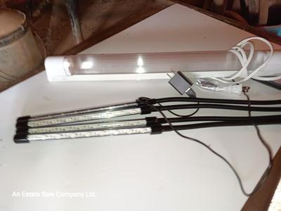 Vazillio LED adjustable arm grow light a with timer and an AFX model SLEU22GR Grow light. 1 of 2