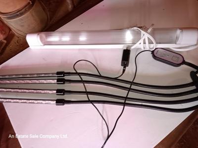 Vazillio LED adjustable arm grow light a with timer and an AFX model SLEU22GR Grow light. 1 of 2