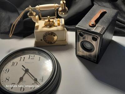 Sterling & Nobel wall clock - Audition telephone radio = and a Brownie Junior six - 16 camera