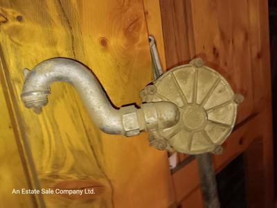 Antique rotary hand crank barrel pump