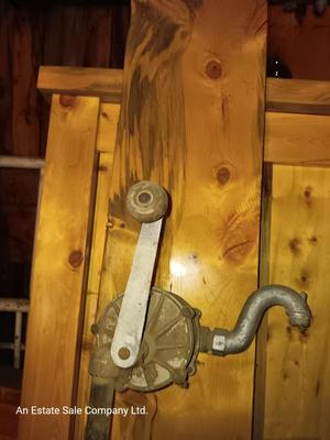 Antique rotary hand crank barrel pump