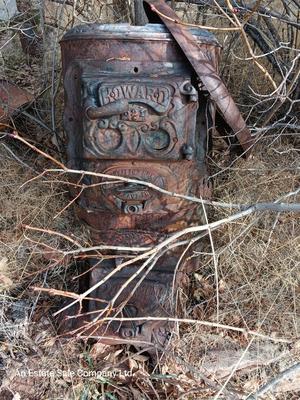 Antique Howard stove for yard art or parts