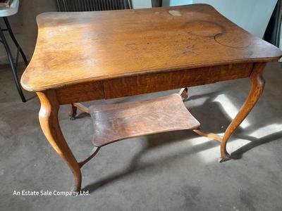 Antique two-tiered table with a drawer