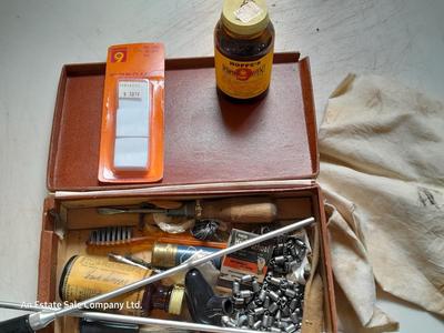 Vintage gun cleaning kit with tools and accessories
