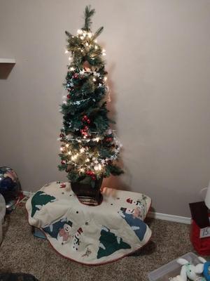 4 FOOT LIGHTED TREE IN A POT WITH TREE SHIRT