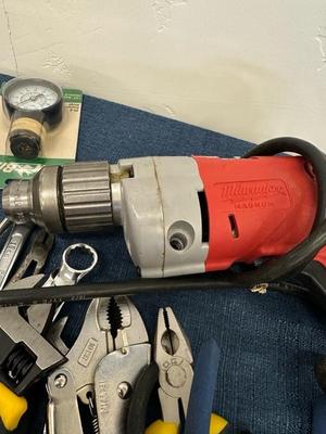 Lot 769 Milwaukee corded drill in miscellaneous tools