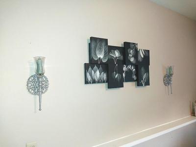 STAGGERED PICTURES ON CANVAS AND 2 WALL SCONCES