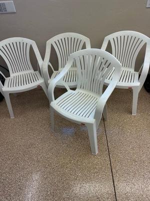 Lot 876 four plastic Rubbermaid stackable chairs