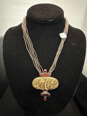 Lot 1022 beaded necklace and sterling pendant