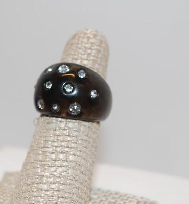 Horseshoe Shape Ring with 10 Stones on Black Acrylic Setting (2.8g) Size: 6 1/4