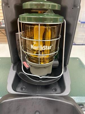 Lot 1416 Coleman, three burner propane stove, and propane Northstar lantern
