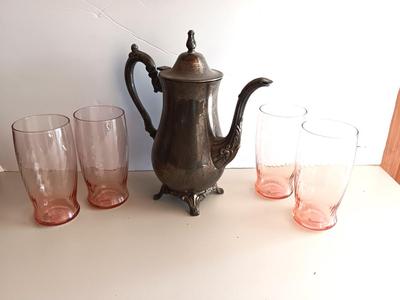 Silver plate Oneida pitcher with four pink toned drinking glasses
