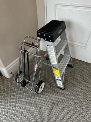 Lot 1082 gorilla step ladder, and rolling luggage cart