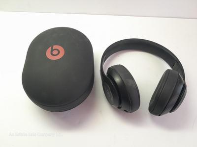 Fold up BEATS headphones with case.