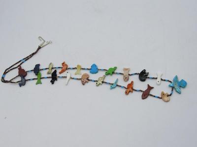 Assorted animal fetish necklace with turquoise thunderbird, bear, fish, turtle, etc