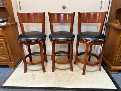 3 SWIVEL BARSTOOLS WITH BLACK LEATHER SEATS