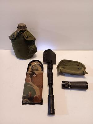 Survival Must haves - folding shovel with storage bag, Canteen with cooler pouch - and a Bushnell monocular