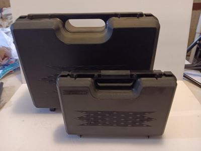 Two plastic DOSKOCIL pistol / gun storage cases