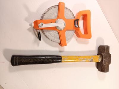 GRIP fabric tape measure with fiberglass handled 3.3 LB sledge hammer.