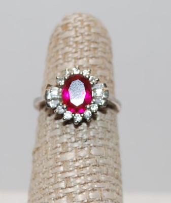 Size 5Â¼ Light Ruby Red Center Stone with Clear Stones Surrounds (3.0g)