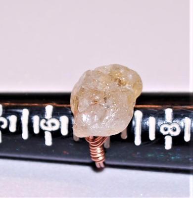 Size: 7 Ring Irregular Opaque Stone on a Wired Copper Style Band (4.9g)