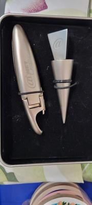 Wine bottle opener and stopper