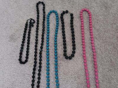 Five colorful beaded necklaces