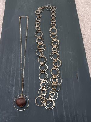 Two necklaces large ring chain and chain with chestnut