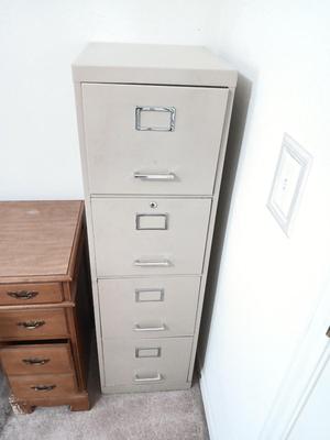 Four drawer metal filing cabinet
