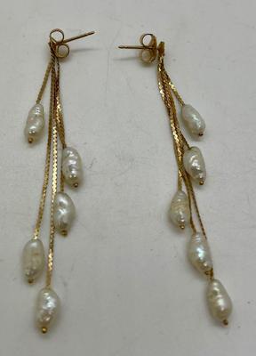 14 karat dangling earrings with natural pearls