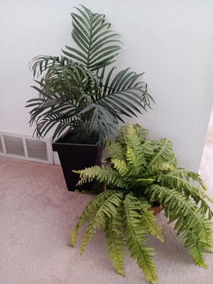 Two faux plants - Fern in basket and Palm in metal pot with light weight flowerpot