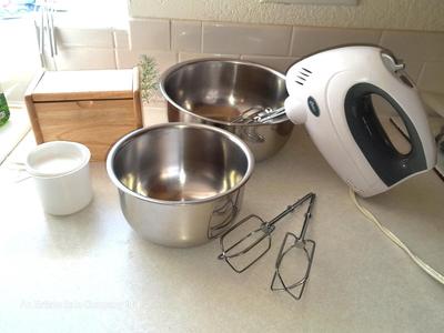 Oster Sunbeam mixer with Recipes in wooden box and two stainless mixing bowls