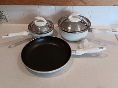 White T-fal cookware Skillet and saucepans