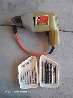 Black and Decker 3/8" electric drill and accessories