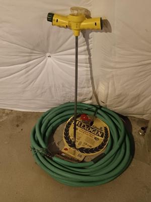 Brand new Gilmore Flexogen 5/8" x 90" hose with water spike fertilizer tool