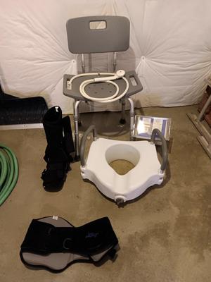Ambulatory medical devices - boot for foot - sling - shower chair - raised toilet seat and crutches