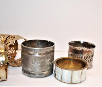 Assortment of 9 Metal Napkin Holders