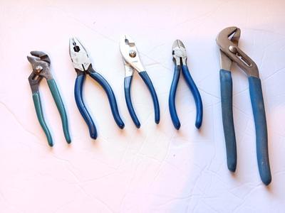 Assortment of pliers with blue handles
